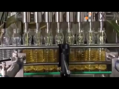 Macchina automatica di riempimento di olio alimentare di tipo lineare e facile da usare con ugelli aspiranti a vuoto